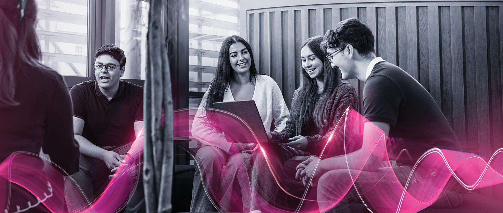 female student sitting in front of computer screen