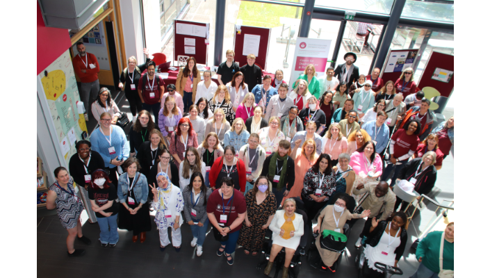 A group photo of attendees at the Summer School