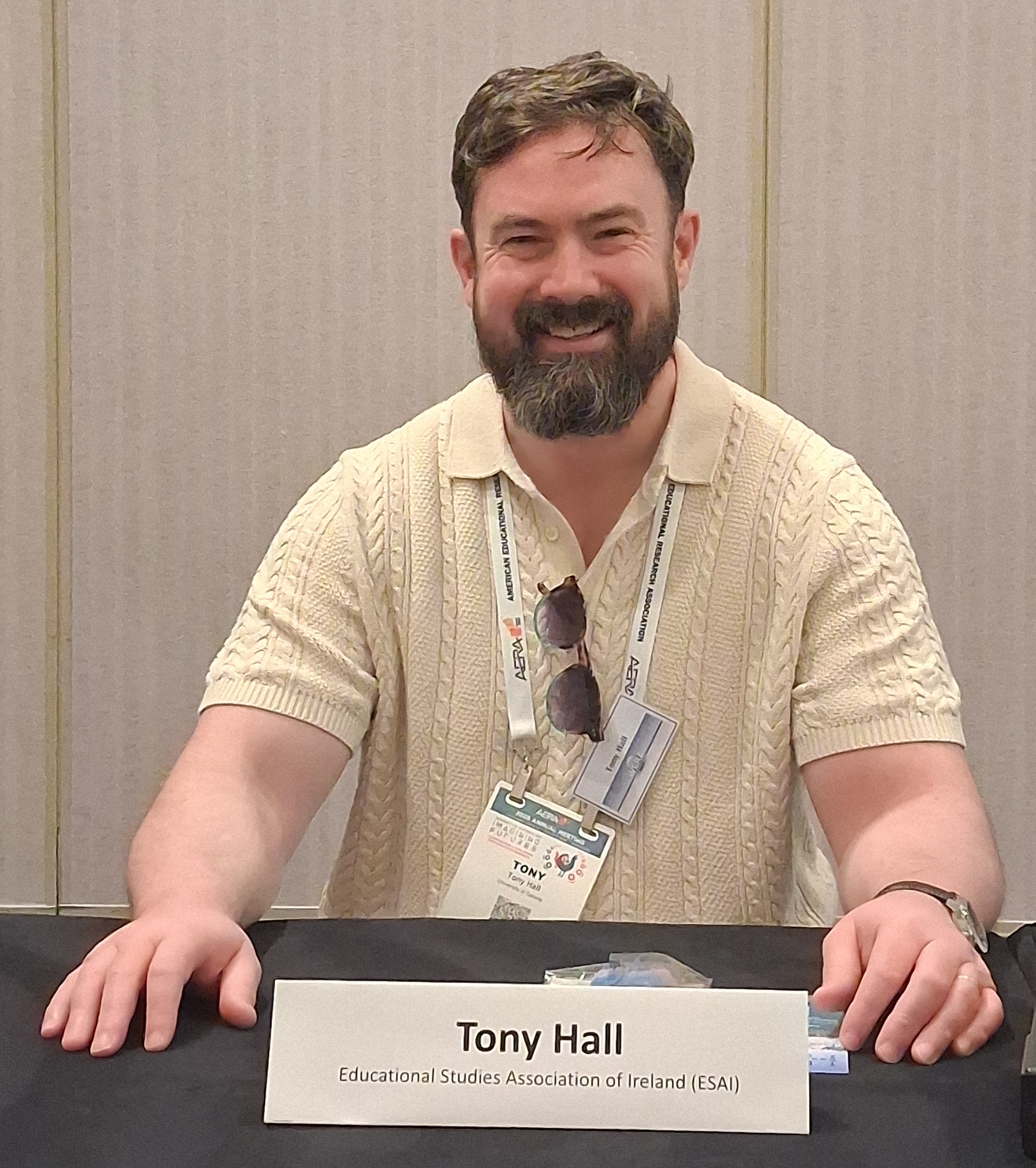 Photo of Prof. Tony Hall speaking at the podium at AERA Conference 2026 in Los Angeles