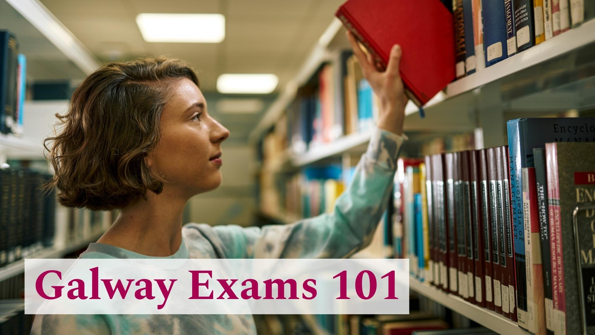 Student placing a book on the shelf in the Library