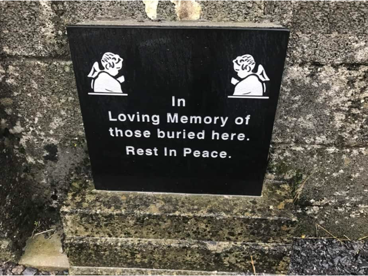 Children&rsquo;s socks hang at a shrine in Tuam, County Galway