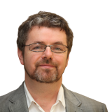 Prof Charlie Spillane