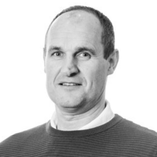 A headshot of Gerard Fahy in black and white